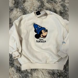 Pre owned. Small stain on sleeve as in photo, otherwise gently used!